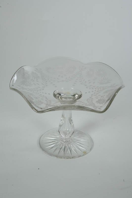 GLASS COMPOTE Intaglio cut glass compote with air trap stem