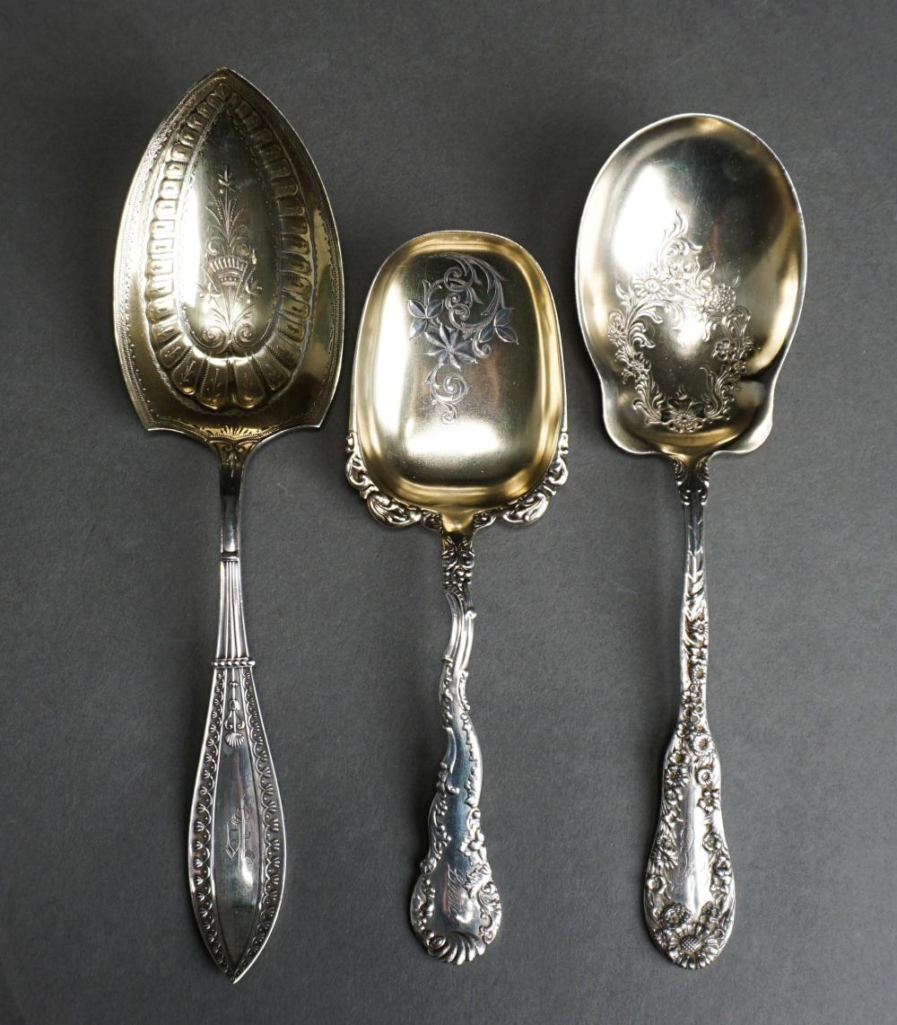 THREE PARTIALLY GOLD WASHED STERLING SILVER SERVING SPOONS GROSS 6