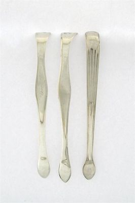 Three pairs of George III silver sugar tongs by Peter