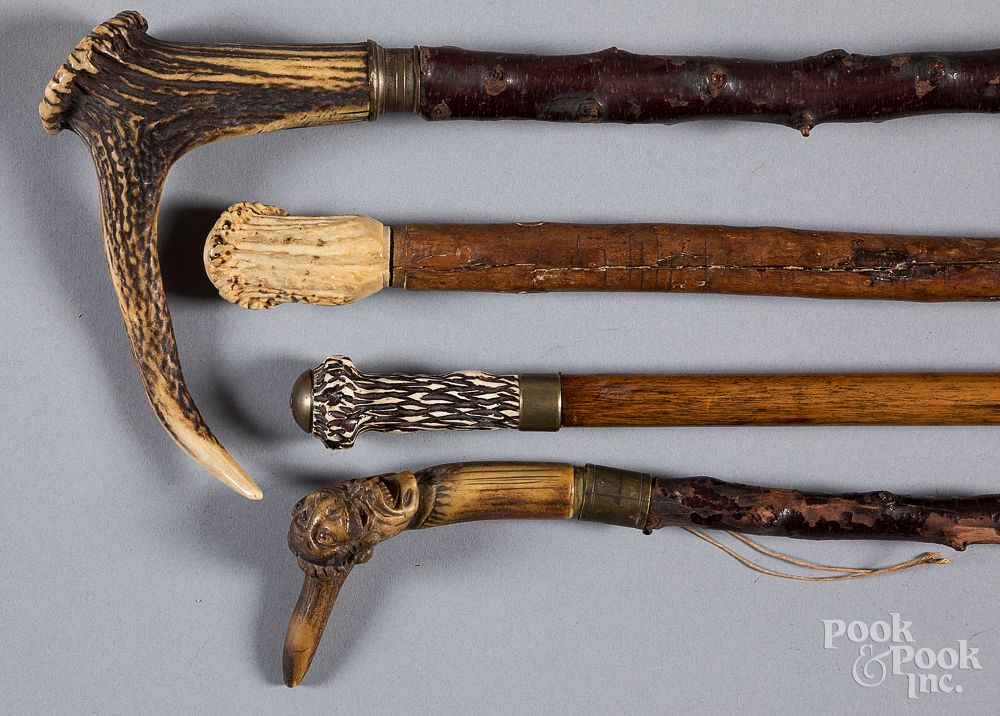 Four assorted canes walking sticks Four assorted canes walking sticks