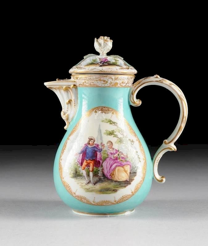 A MEISSEN PARCEL GILT AND POLYCHROME PAINTED PALE BLUE GROUND