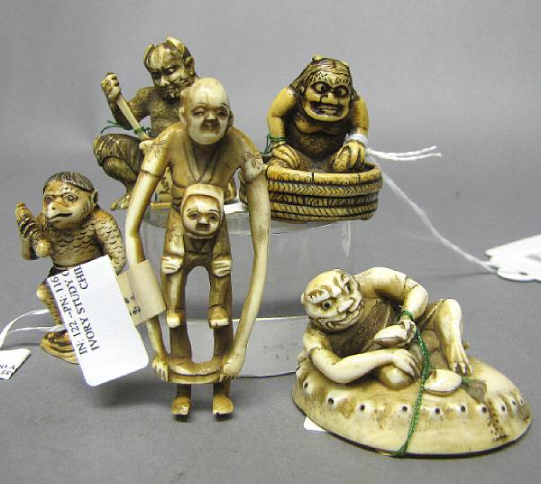 A group of four ivory netsuke 20th Century Including a
