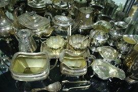A quantity of assorted silver plate tea and coffee wares