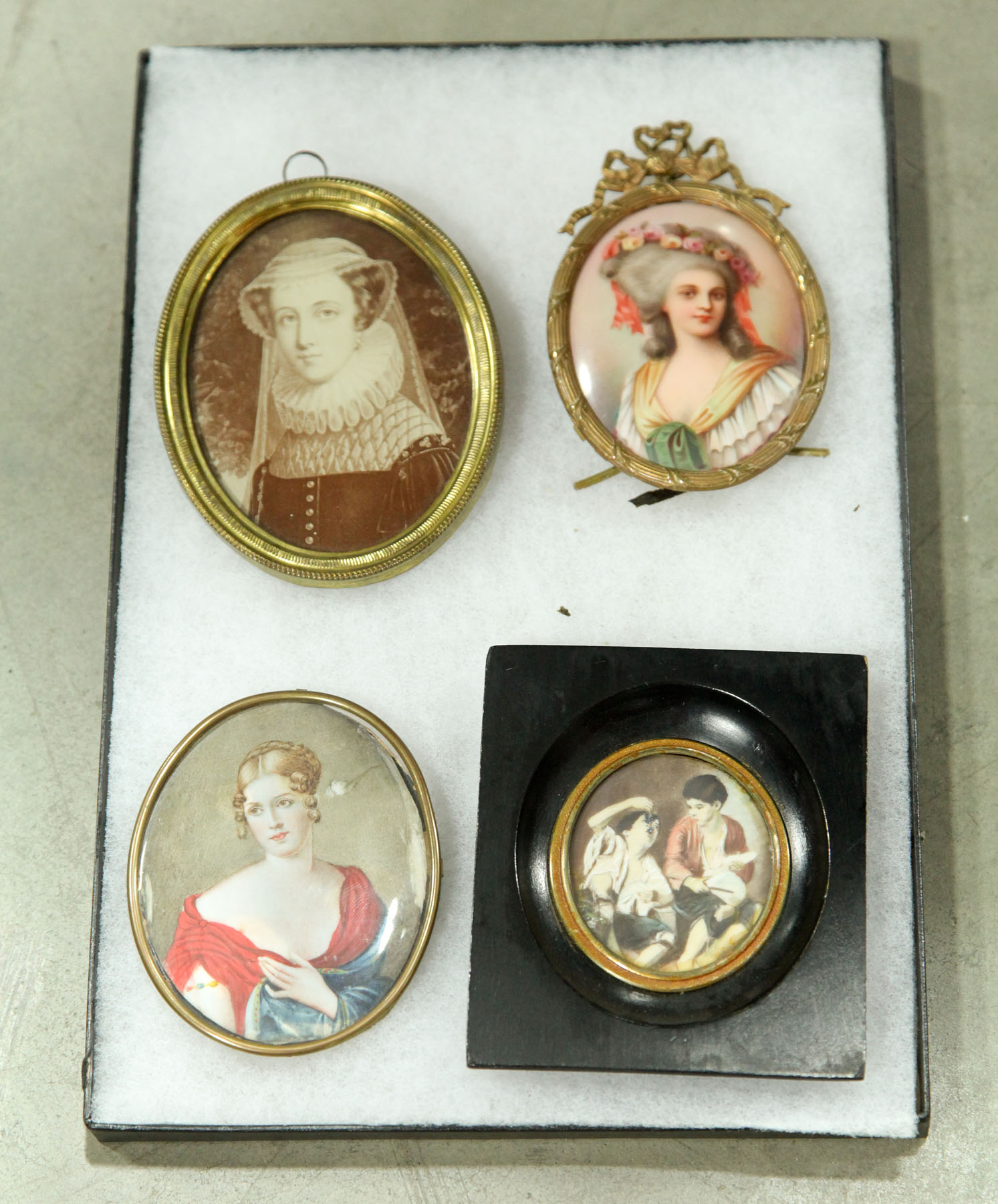 FOUR MINIATURE PORTRAITS European late to early 20th century Half