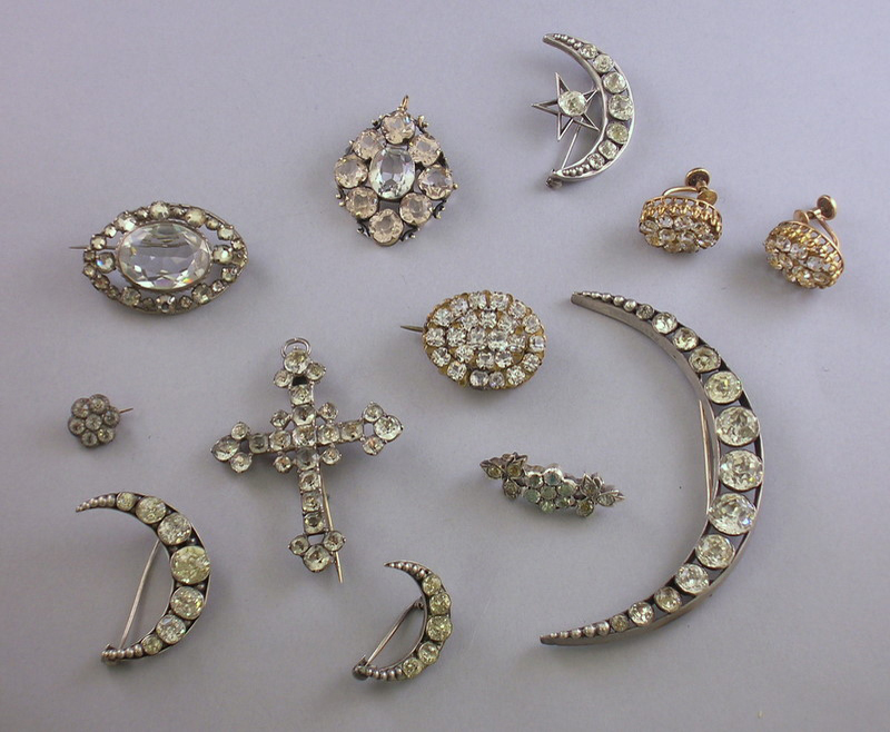 Eleven Pieces of Paste Jewelry including ten brooches and a