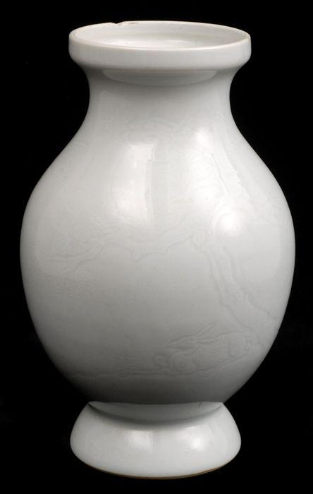 CHINESE CELADON GLAZED BALUSTER FORM VASE WITH INCISED DECORATION With