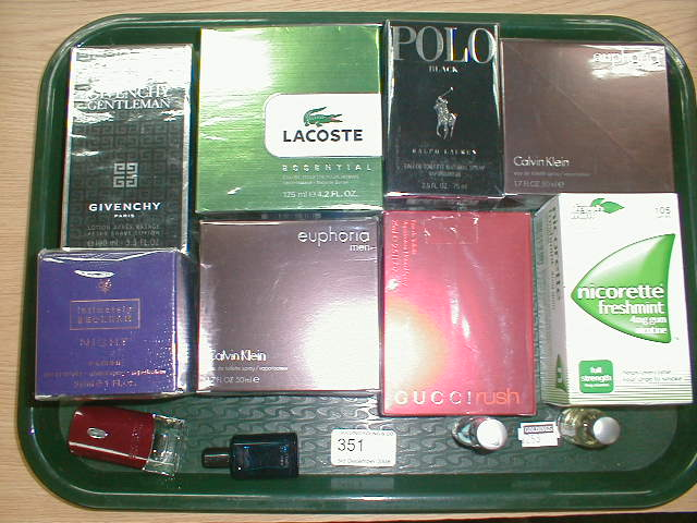 A selection of aftershave and perfume in original packaging