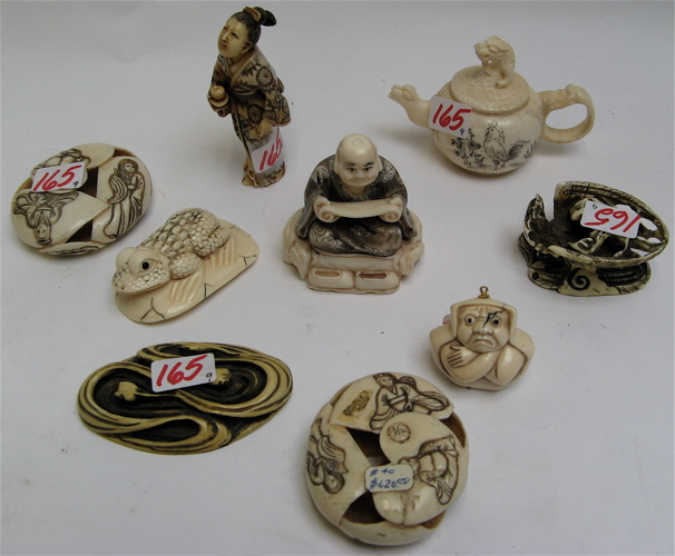 A GROUP OF NINE IVORY KATABORI MANJU et al including