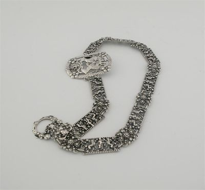 A Dutch marriage belt consisting of cast linked panels each