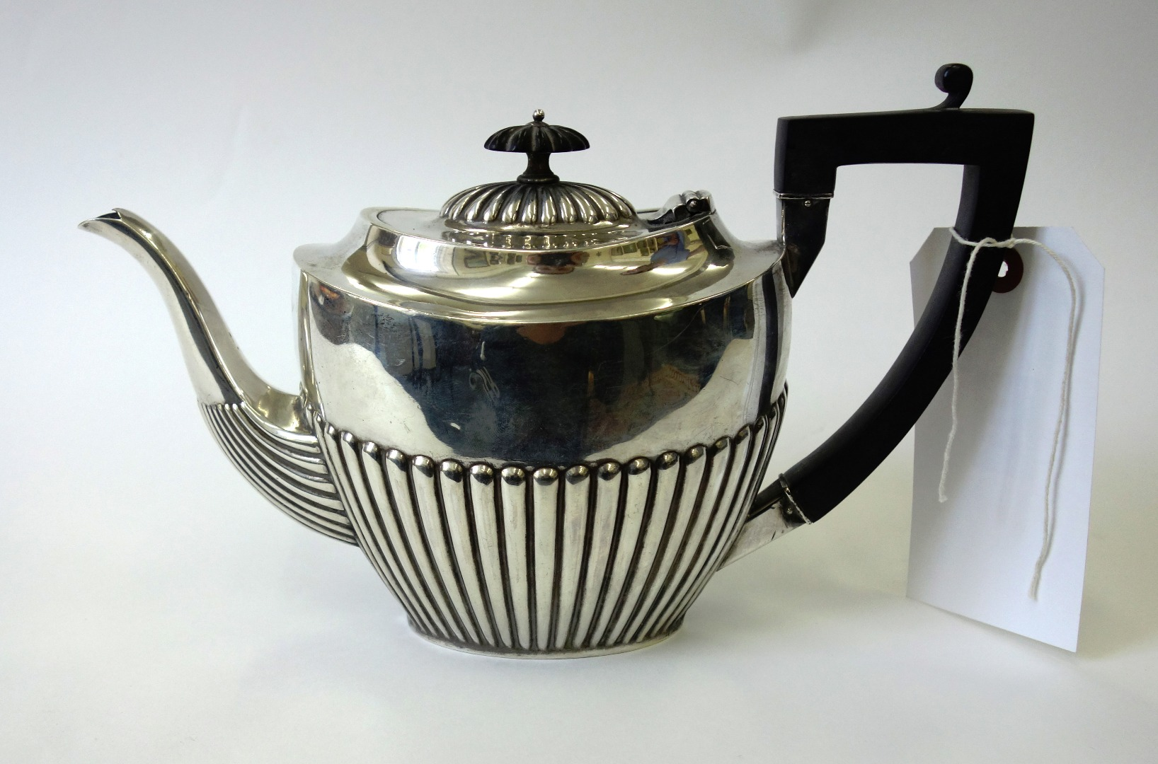 A late Victorian oval silver teapot Ward Brothers Birmingham 1894