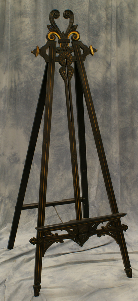 Ebonized Victorian easel in the Neo Grec style gilt trim