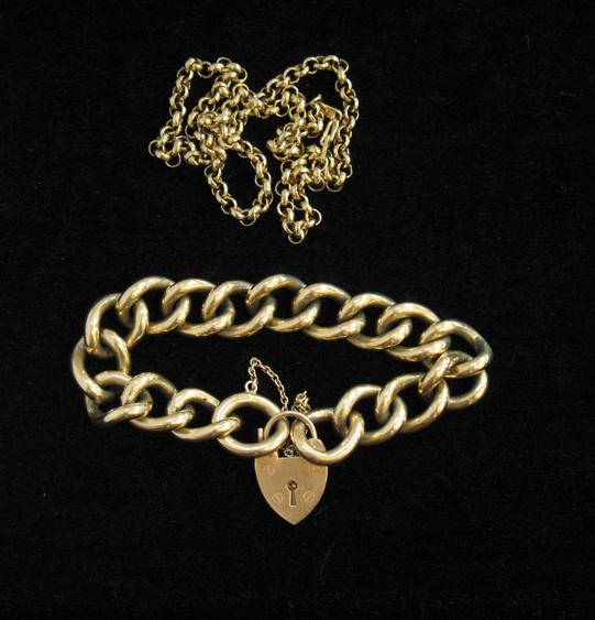A GENTLEMAN S 9CT YELLOW GOLD LARGE CURB LINK BRACELET