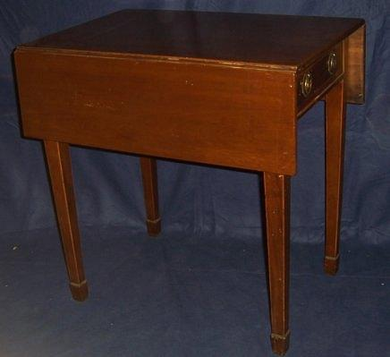 A George III mahogany Pembroke table with two rectangular flaps