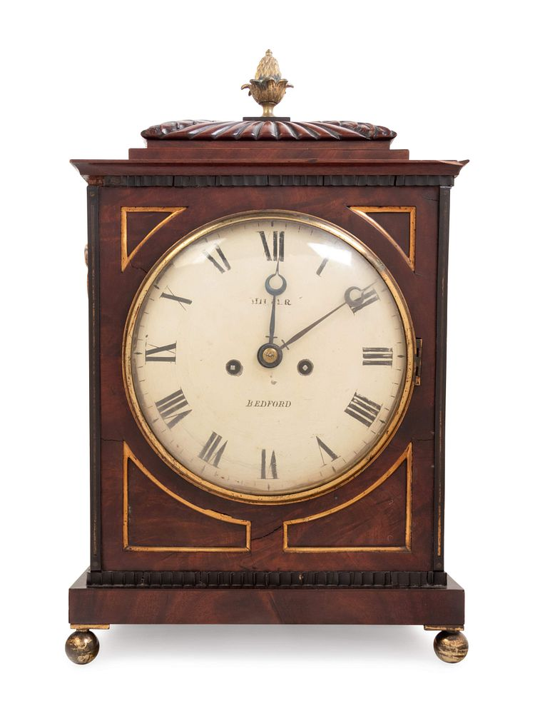 A Regency Brass Mounted Mahogany Bracket Clock A Regency Brass