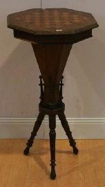 A Victorian oak mahogany and inlaid octagonal work table with