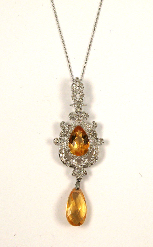 CITRINE AND DIAMOND PENDANT NECKLACE the pendant suspended on a