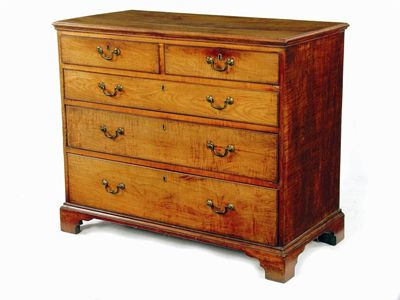 An 19th century fruitwood chest the applied moulded edge top