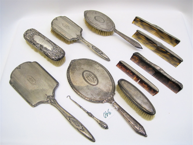 ELEVEN STERLING SILVERPLATED DRESSER ITEMS in assorted patterns Sterling by