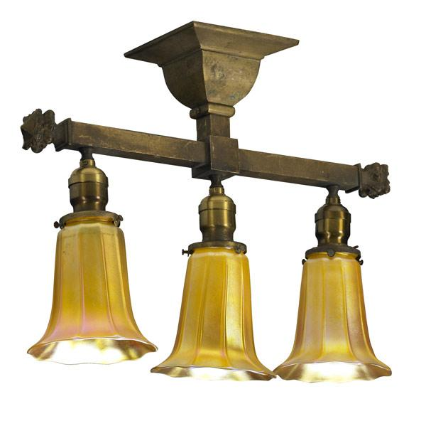 QUEZAL Three light brass ceiling fixture with ribbed gold shades