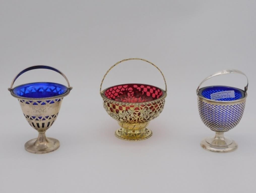 cranberry glass inserts To include an English sterling openwork basket