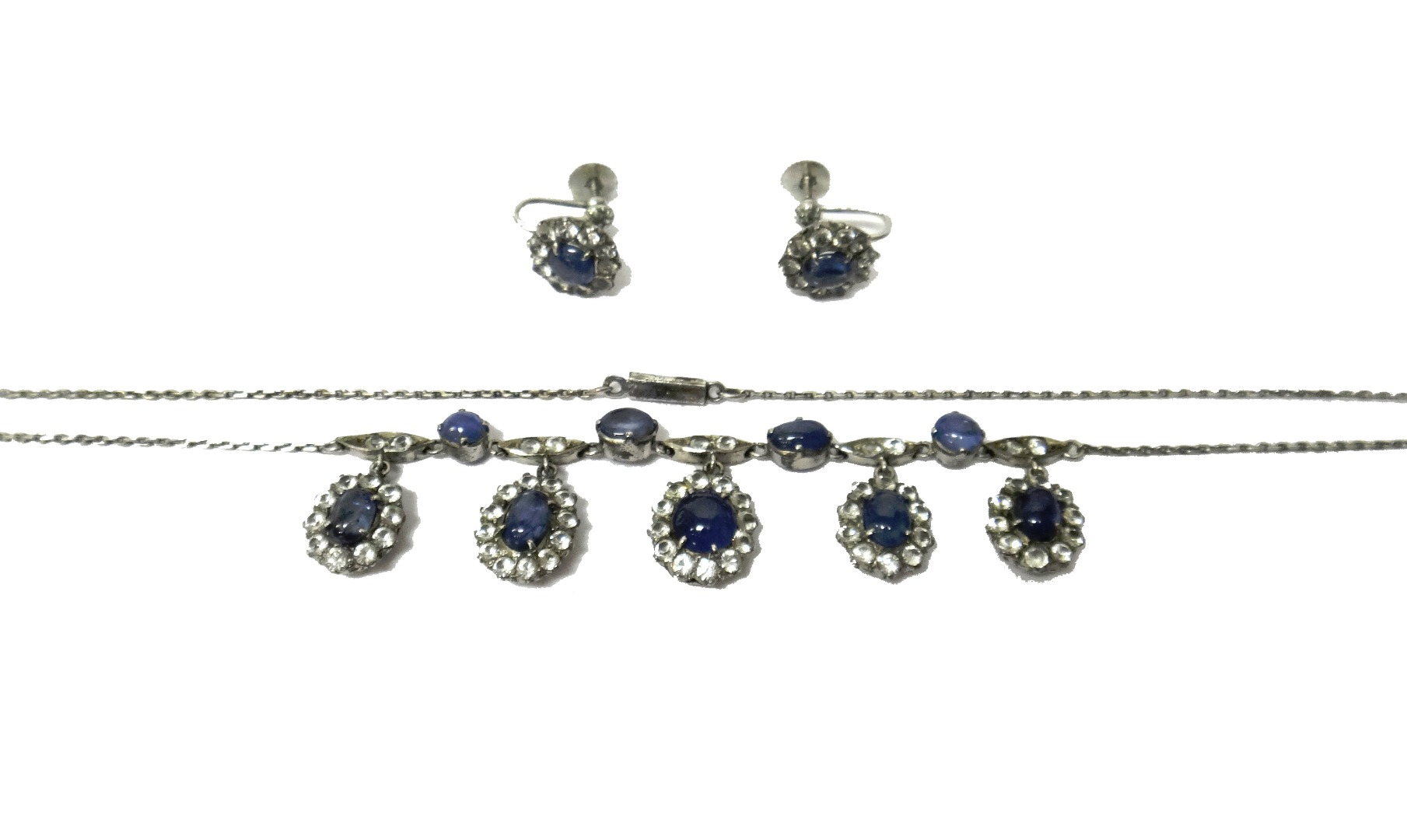A cabochon sapphire and colourless sapphire set necklace Ceylonese circa