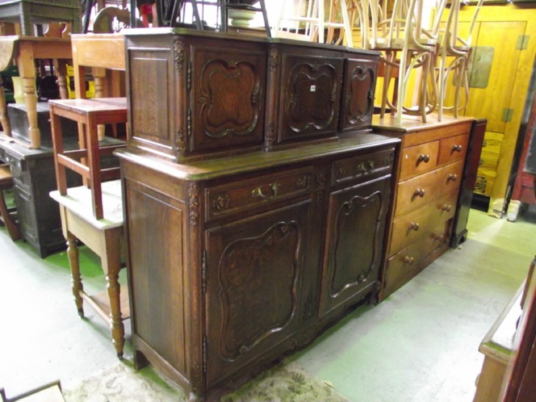 A continental medium oak two sectional buffet the upper section