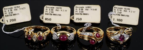 A ruby and diamond ring by Dianoor set with two