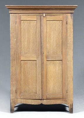 Grain painted South Carolina wardrobe yellow pine throughout two paneled
