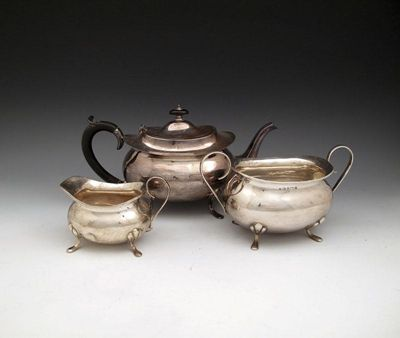 A three piece silver tea set by J Gloster Limited