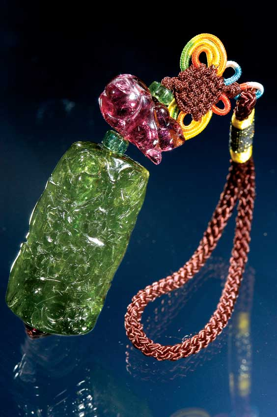 CARVED TOURMALINE PENDANT Fine Chinese carved green tourmaline pendant of