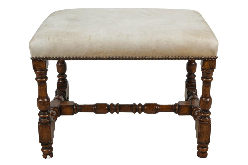 TURNED WOOD UPHOLSTERED FOOT STOOLcovered with off white suede or