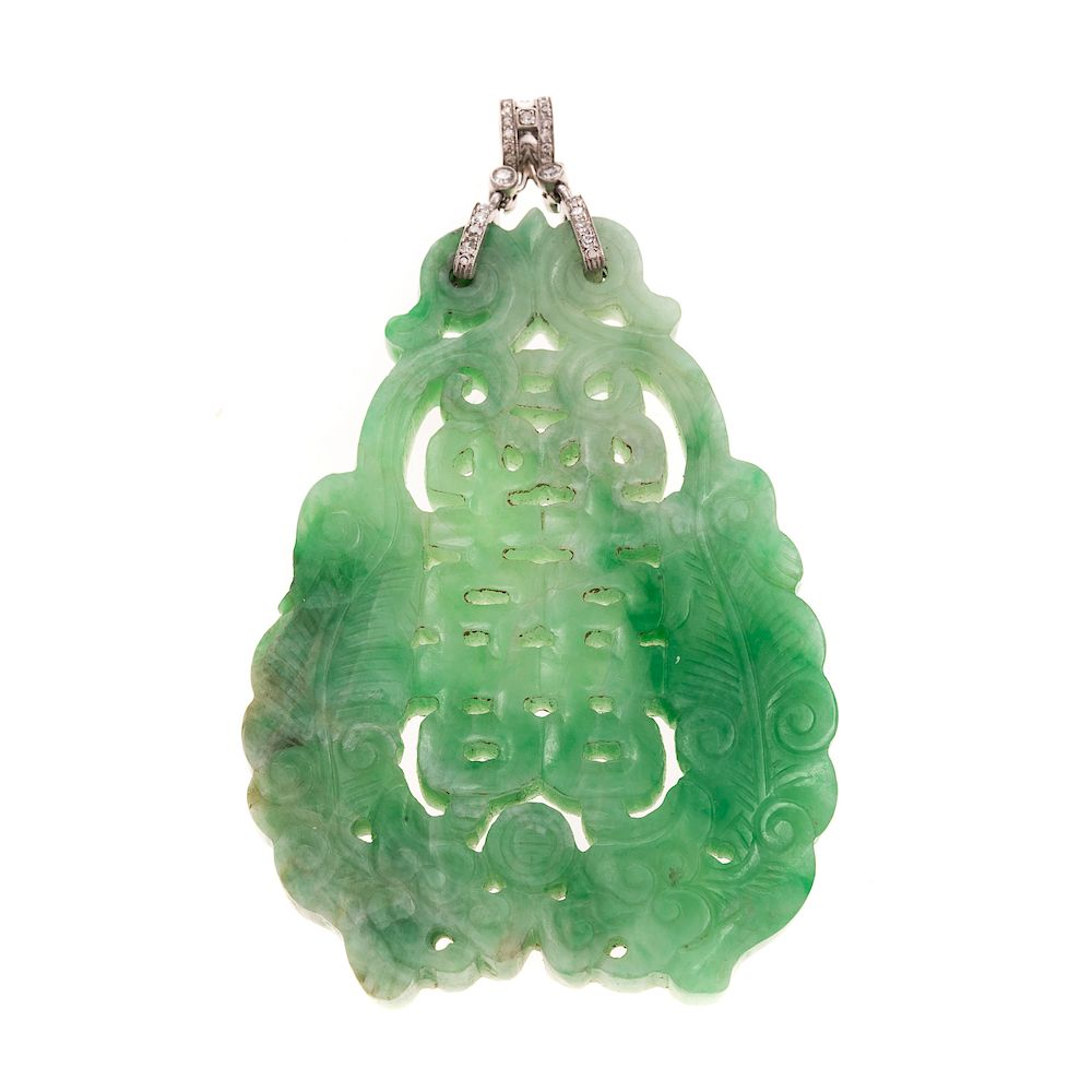 A Pierced Jadeite Pendant with Platinum Diamonds Platinum vintage bail