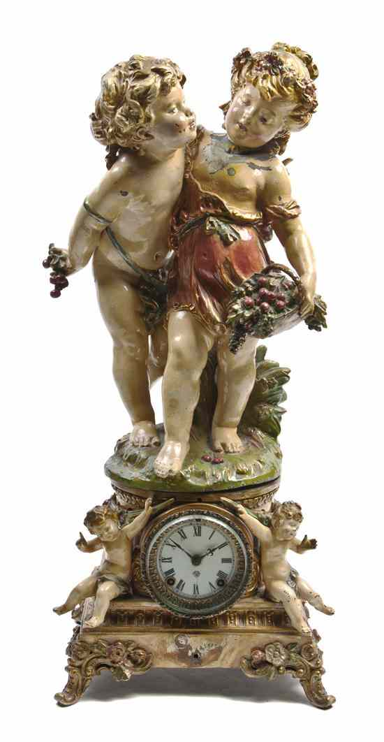 An Ansonia Cold Painted Cast Metal Figural Mantel Clock circa