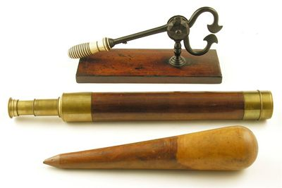 An early 19th century wrought iron sugar cutter with a