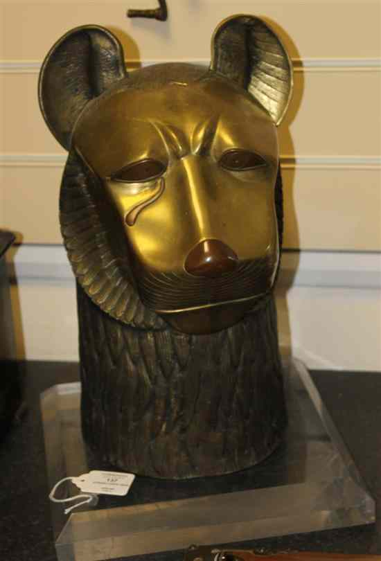 A Syrian style copper mounted brass lion s head on