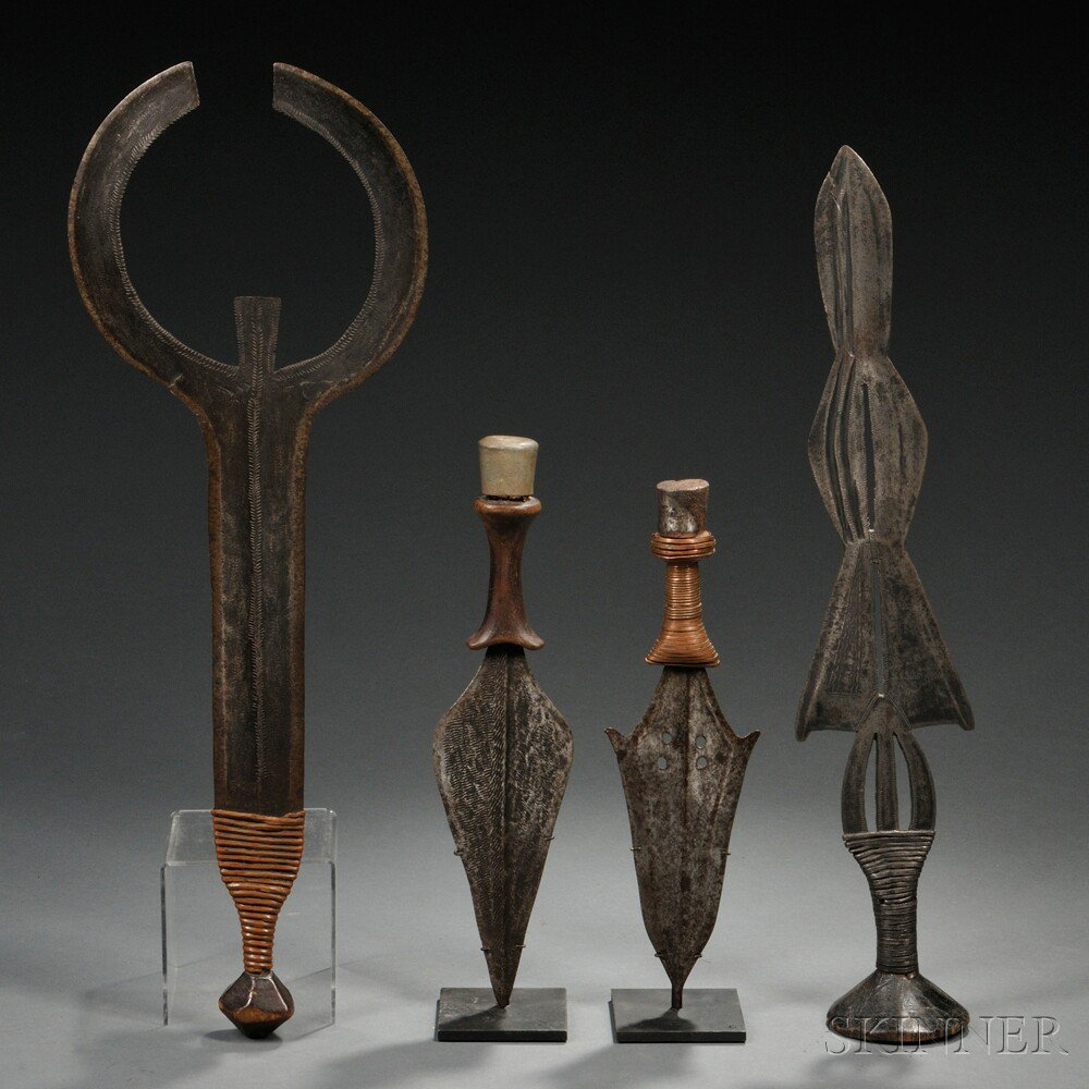 Four African Weapons includes an Ngombe sword a human shaped