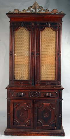 Leaf and scroll cresting twin glazed doors raised borders with