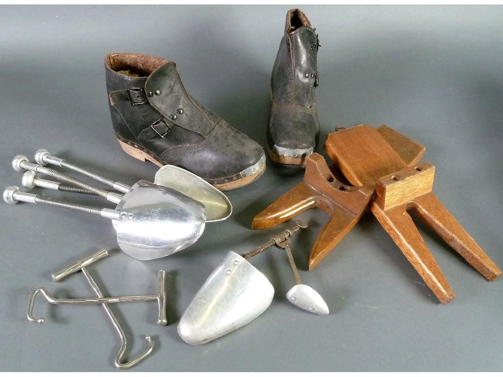 PAIR OF HARDWOOD BOOT REMOVERS PAIR OF PLATED METAL BOOT
