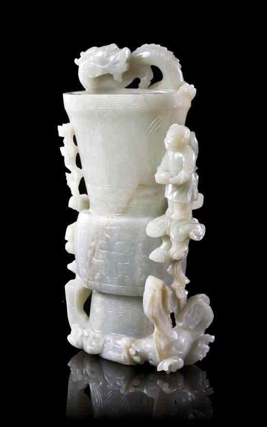 A Carved Jade Beaker Vase late 18th century of pale