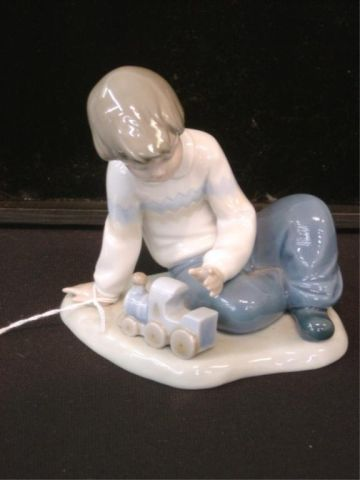 NAO BY LLADRO FIGURINE BOY W TOY
