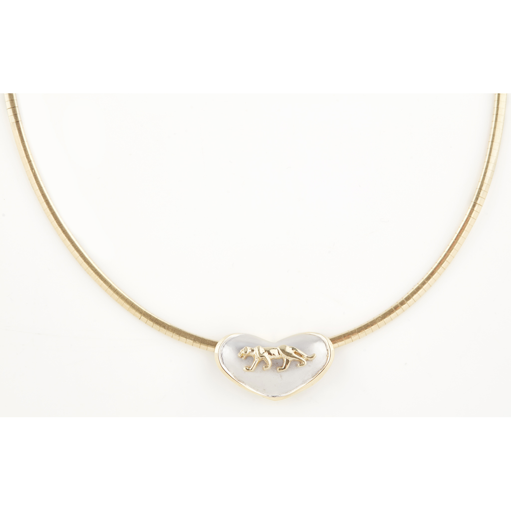 A contemporary pendant necklace the silvered heart with applied jaguar