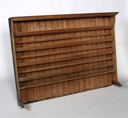 A 19th century pine plate rack the projected moulded cornice