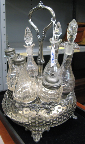 AN AMERICAN 19TH CENTURY VICTORIAN CASTER SET Silver plate with