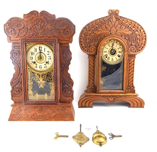 CLOCKS Two 19th C gingerbread mantle clocks oak the first