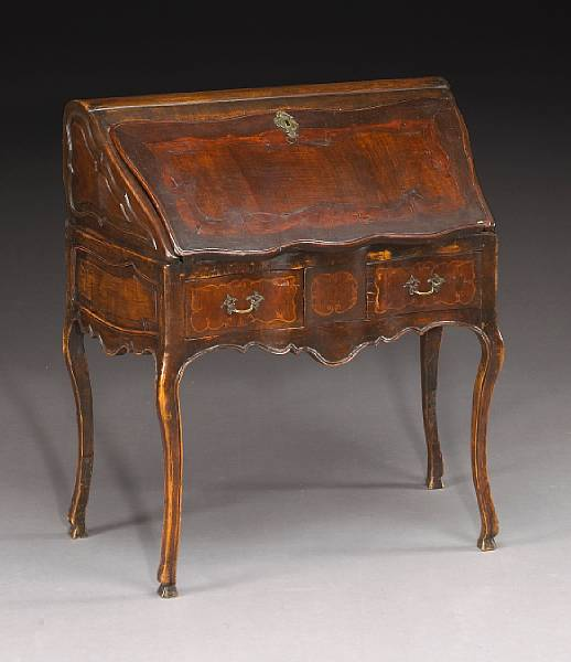 An Italian Rococo walnut desk third quarter 18th century The