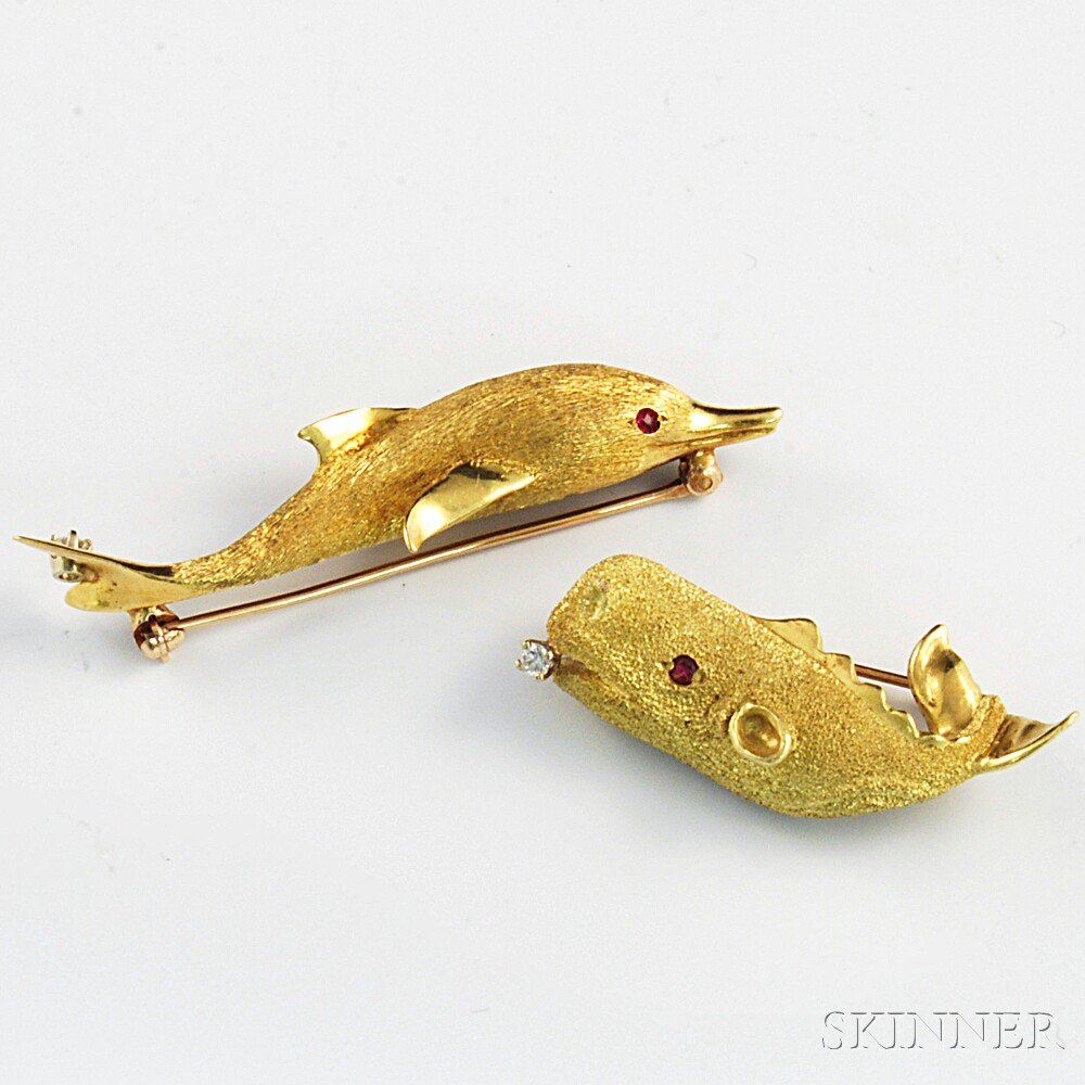 Two 18kt Gold Figural Pins a whale and a dolphin