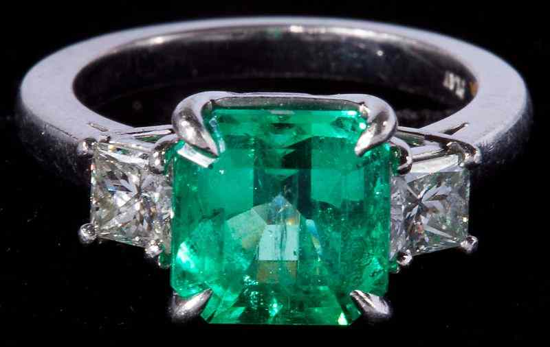 Platinum Emerald and Diamond Ringcentering on one square cut emerald