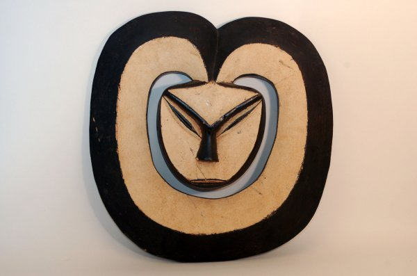 Kwele Ekuk mask of wood with whitened heart shaped face