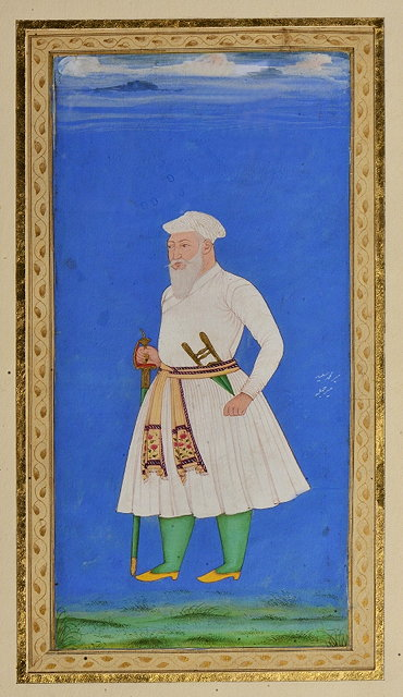 AN INDIAN MINIATURE PAINTED WITH BEARDED NOBLEMAN BRANDISHING A SWORD