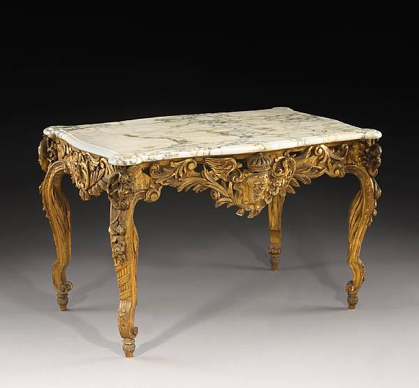 A Louis XV style giltwood table de milieu second half